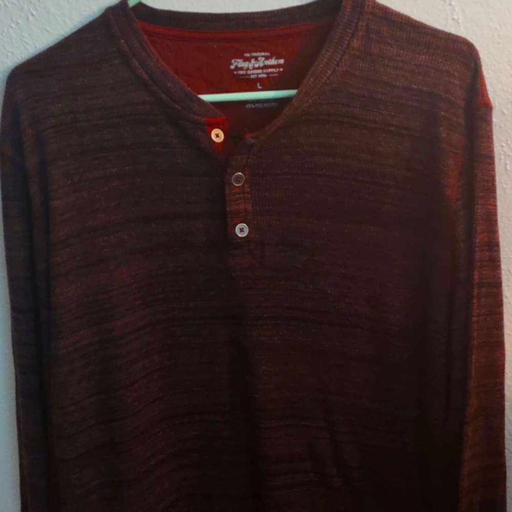Men's long sleeve 3 button shirt.